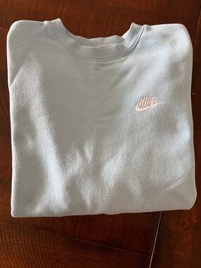 Nike Pale Blue Crewneck Sweatshirt size M gently used, smoke free home.